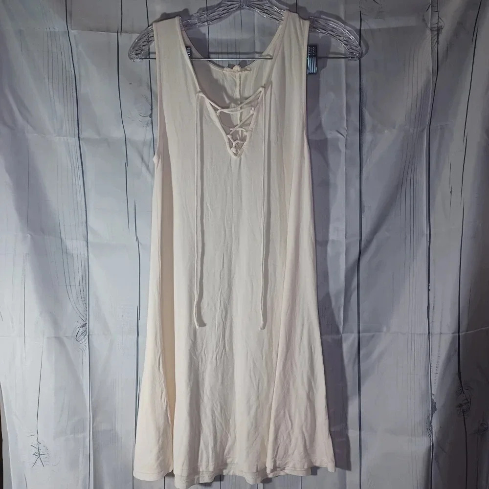L.A Hearts mini sleeveless boho coquette flowy swing dress with lace-up neckline